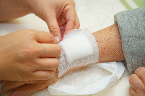 close up of bandage care on arm